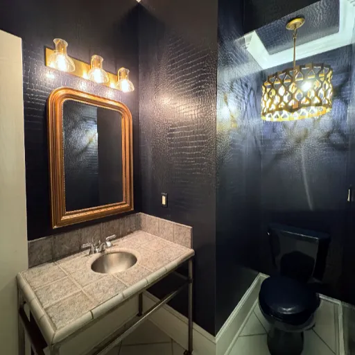 Purple bathroom installation with contemporary chandelier